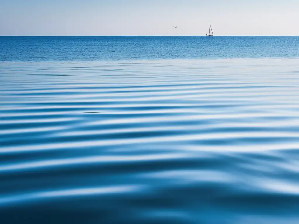 Importancia habilidades blandas salud mental: Océano azul sereno, cielo claro, velero en armonía